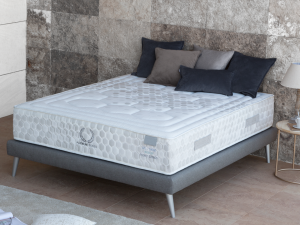 Colchón Evolution compuesto por núcleo de muelles ensacados Shox System K-Spring Pocket y visco Gel Therm regulador de la temperatura corporal.